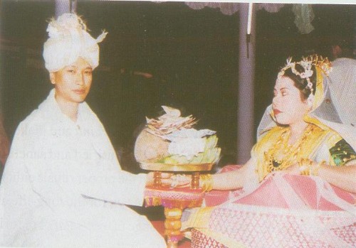  Bride and Bridegroom holding the Kujapot : from N Mangi Devi's book 