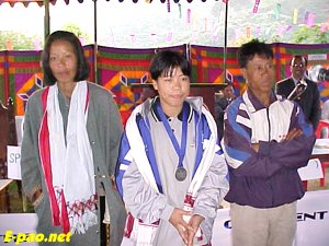 A file photo of Mary Kom with her parents during a reception function hosted by Kom Rem Students Union last year on her winning Silver medal in the 1st Women Introducing World Boxing Championship held at Pennsylvania in USA.